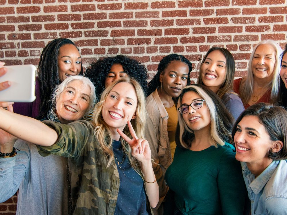 Group of diverse women taking a selfie